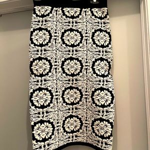 Bebe stretch fitted skirt. Knee length. Excellent condition.